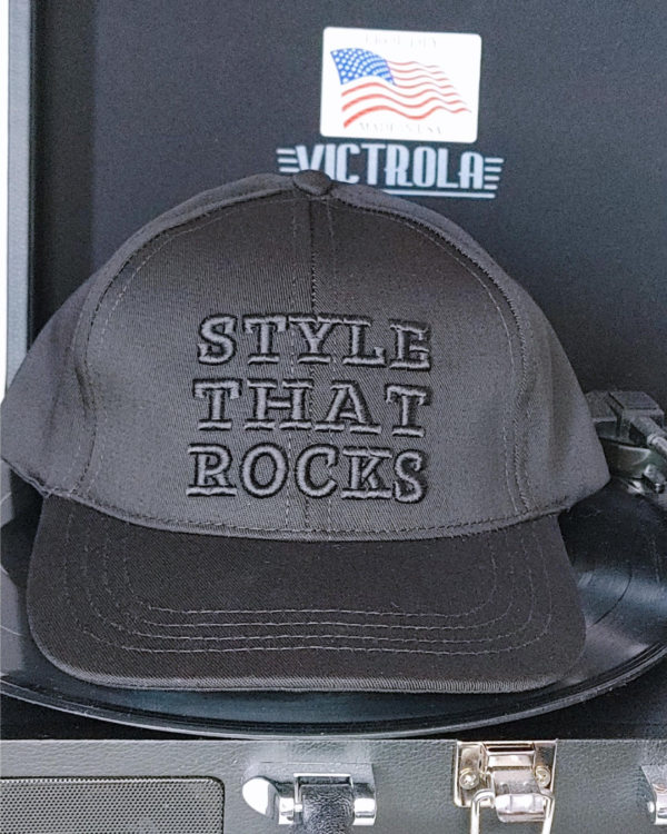A hat that says style that rocks on it.